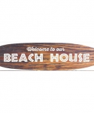 Metalen surfboard beach house