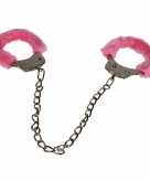 Voetboeien met roze pluche